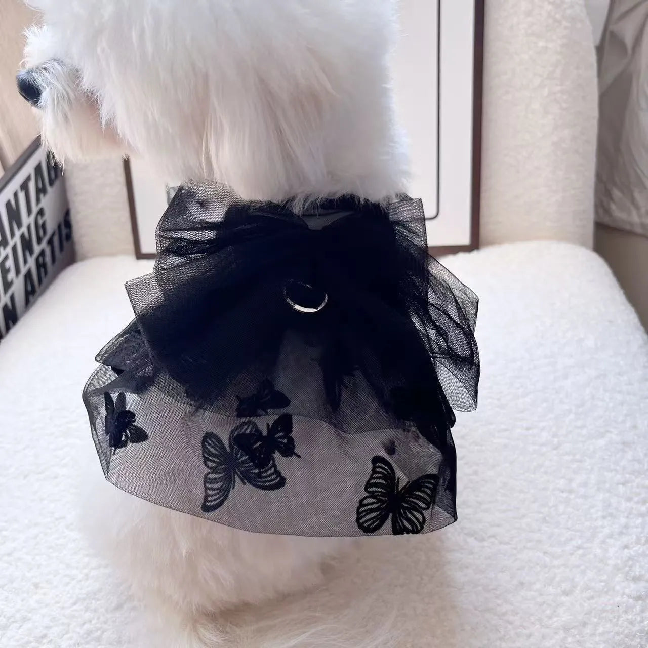 Black tulle princess skirt for a small dog or cat on a mannequin.
