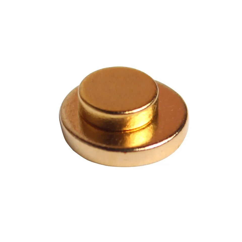 Gold quit smoking magnet earrings set with two sizes 0.5cm and 0.8cm on ear for auricular acupressure therapy