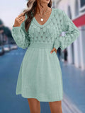 Artistic retro ethnic V-neck beach dress with 3D pattern, long sleeves, and high waist.
