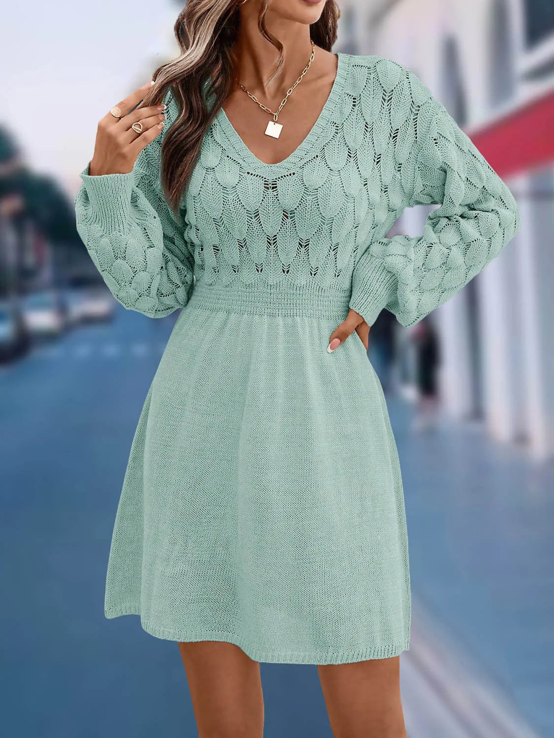 Artistic retro ethnic V-neck beach dress with 3D pattern, long sleeves, and high waist.