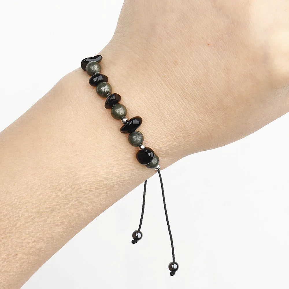 Black stone beaded bracelet with geometric garnet gravel beads and moon design element