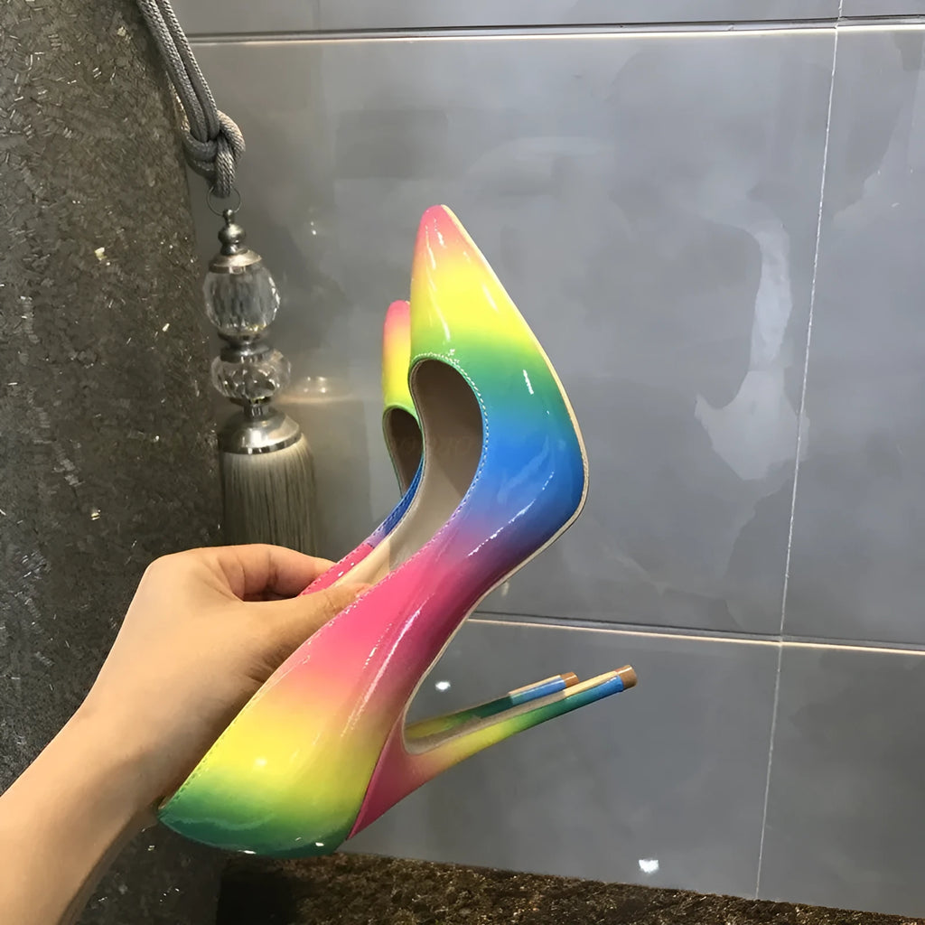 Women's rainbow patent leather high heel court shoes with pointed toe and thin ultra-high heel.