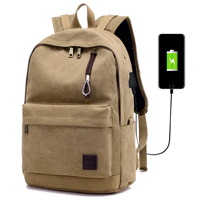 Canvas backpack in grey colour showing external USB port and multiple compartments.