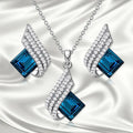 Cross chain necklace with electroplated alloy pendant and matching glass ear stud earrings set