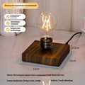 Suspended bulb creative night lamp with wooden base on desktop