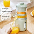 Portable electric citrus juicer in fresh green with USB charging cable and cleaning brush