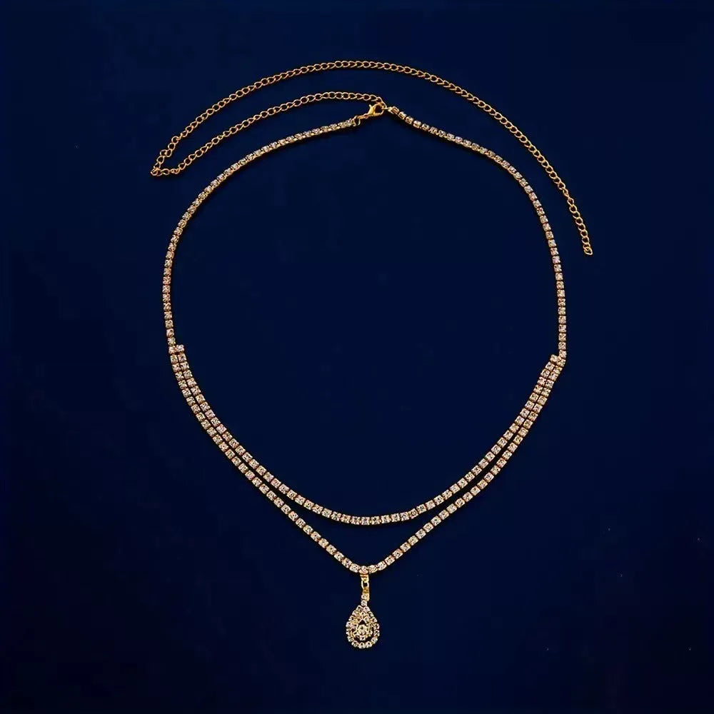 Gold or silver rhinestone waist chain with water drop pendant and lobster clasp closure
