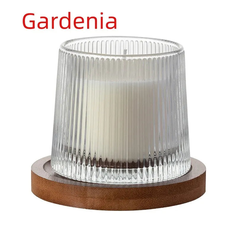 Soy wax aromatherapy candle in cup shape with rotating design, available in multiple fragrances