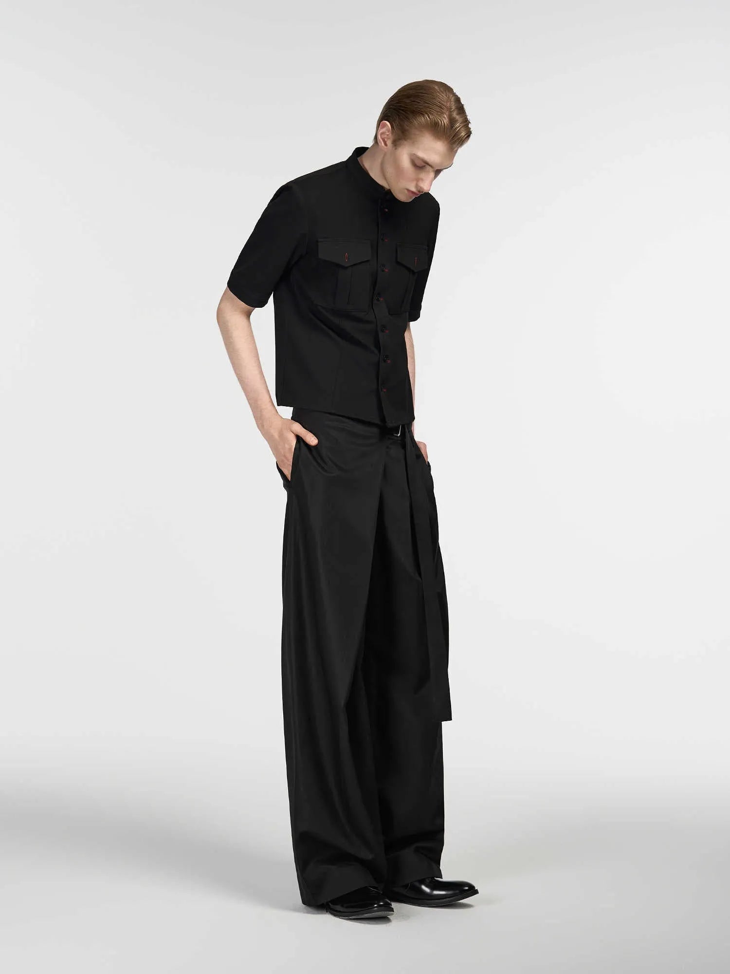 Black straight-leg trousers with adjustable waist and single pleat detailing