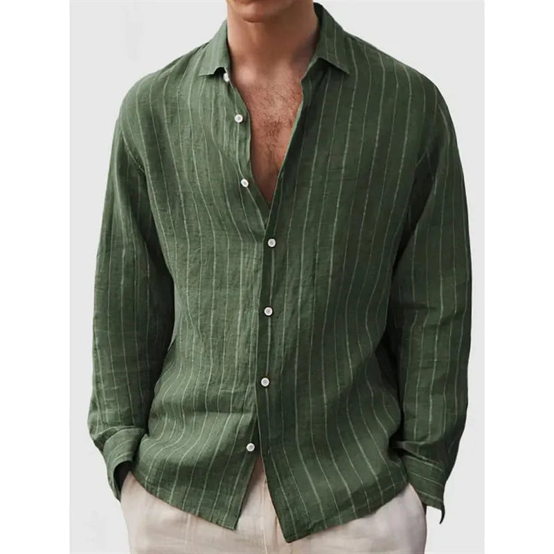 Man wearing a loose-fit striped long sleeve cardigan-style shirt in a casual setting.
