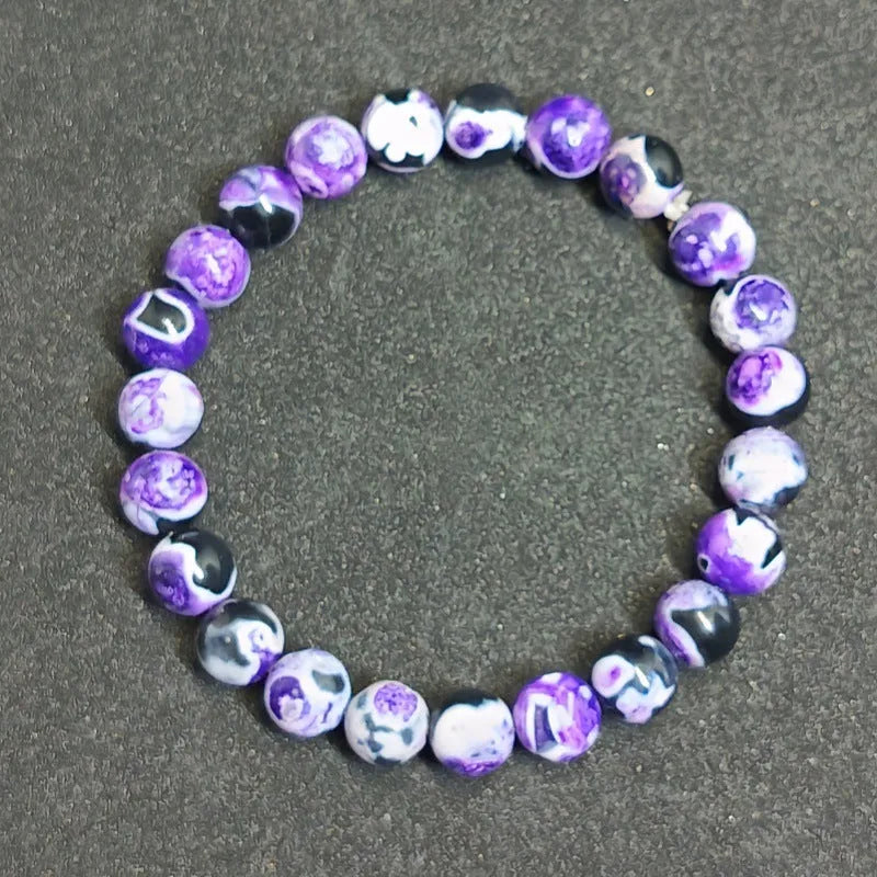 Handmade 8mm natural agate and glass bohemian bracelet in assorted colours.