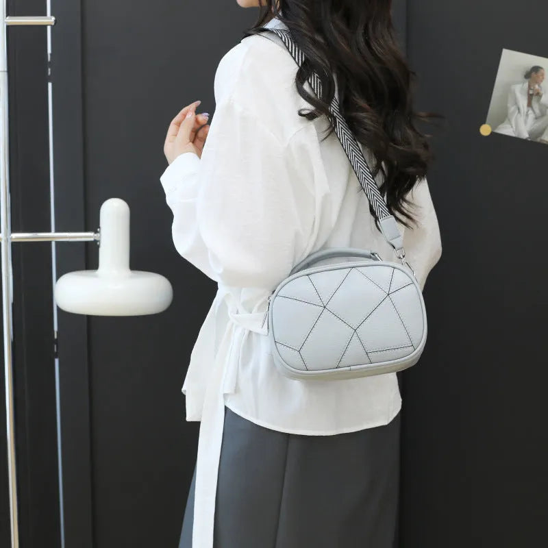 Round grey retro patchwork small bag with visible stitching, 20x15 cm size.
