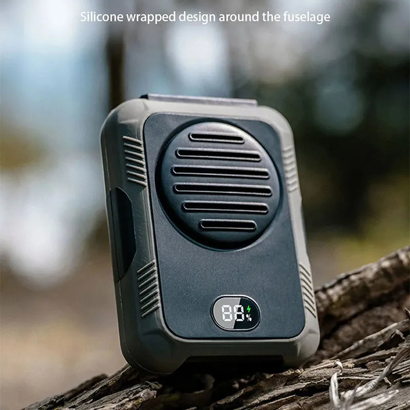Green leafless hanging neck fan with USB charging port, shown for outdoor use.
