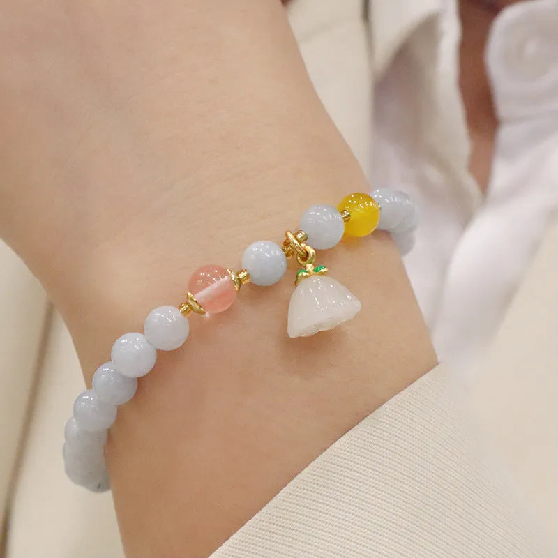 Women's aquamarine artificial crystal bracelet with gold-plated chalcedony pendant in floral design