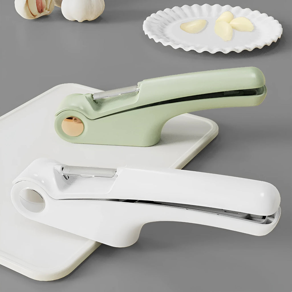 Manual garlic press in white colour with ABS plastic body and stainless steel mechanism