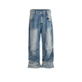 Men's blue white washed denim jeans with baggy cut and straight-leg design showing profile pleating details