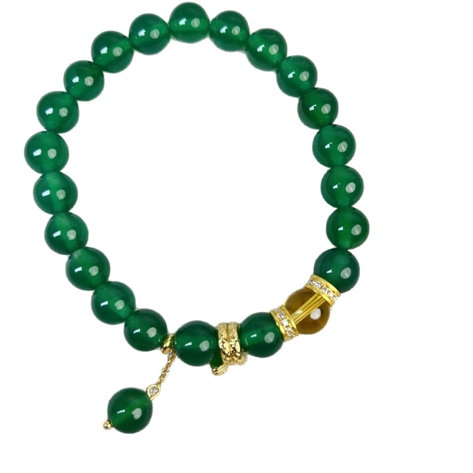 Green and red agate stone bead wealth snake bracelet with copper details on a wrist.