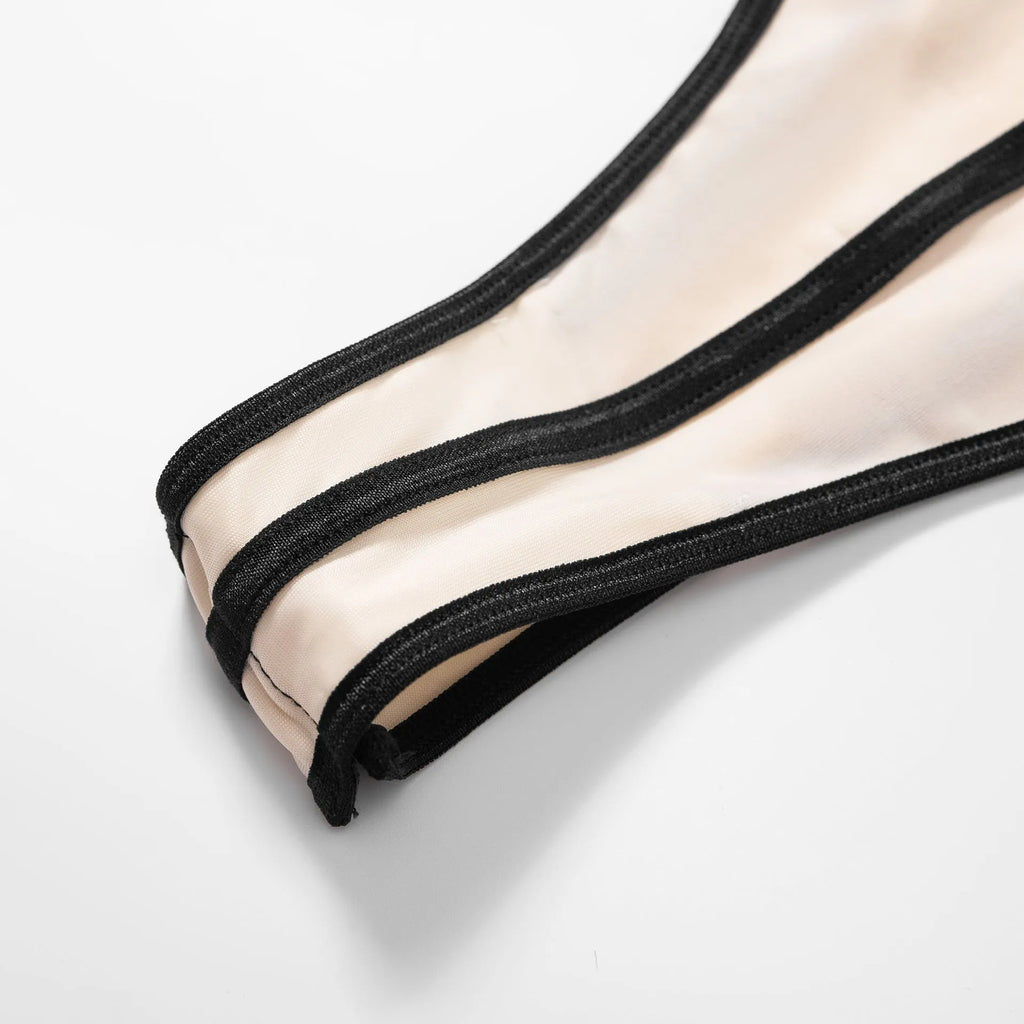 Khaki bodybuilding jumpsuit with sleeveless top, shorts, and hollow-out contrast panels.