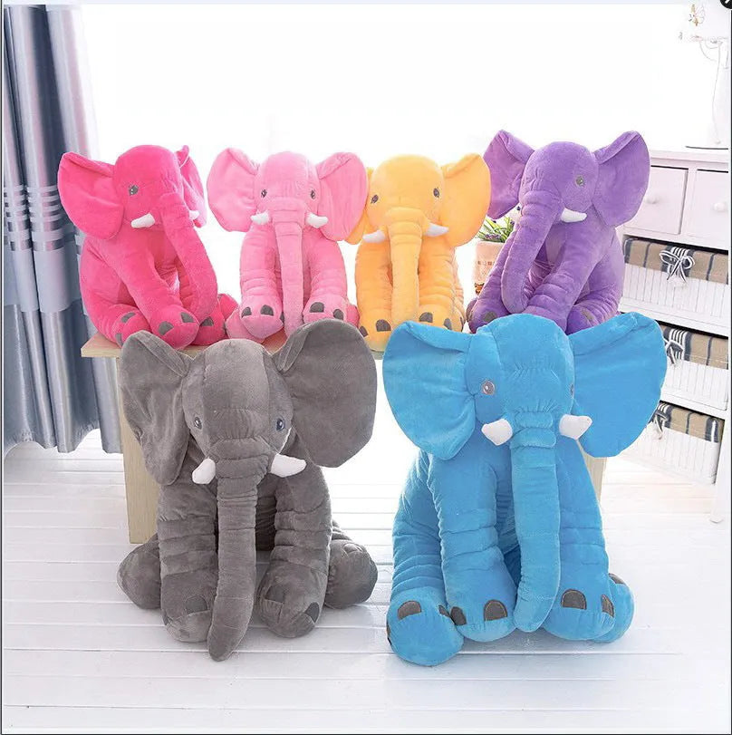 Soft grey elephant plush pillow cover for a child's bed, shown with other colour options.