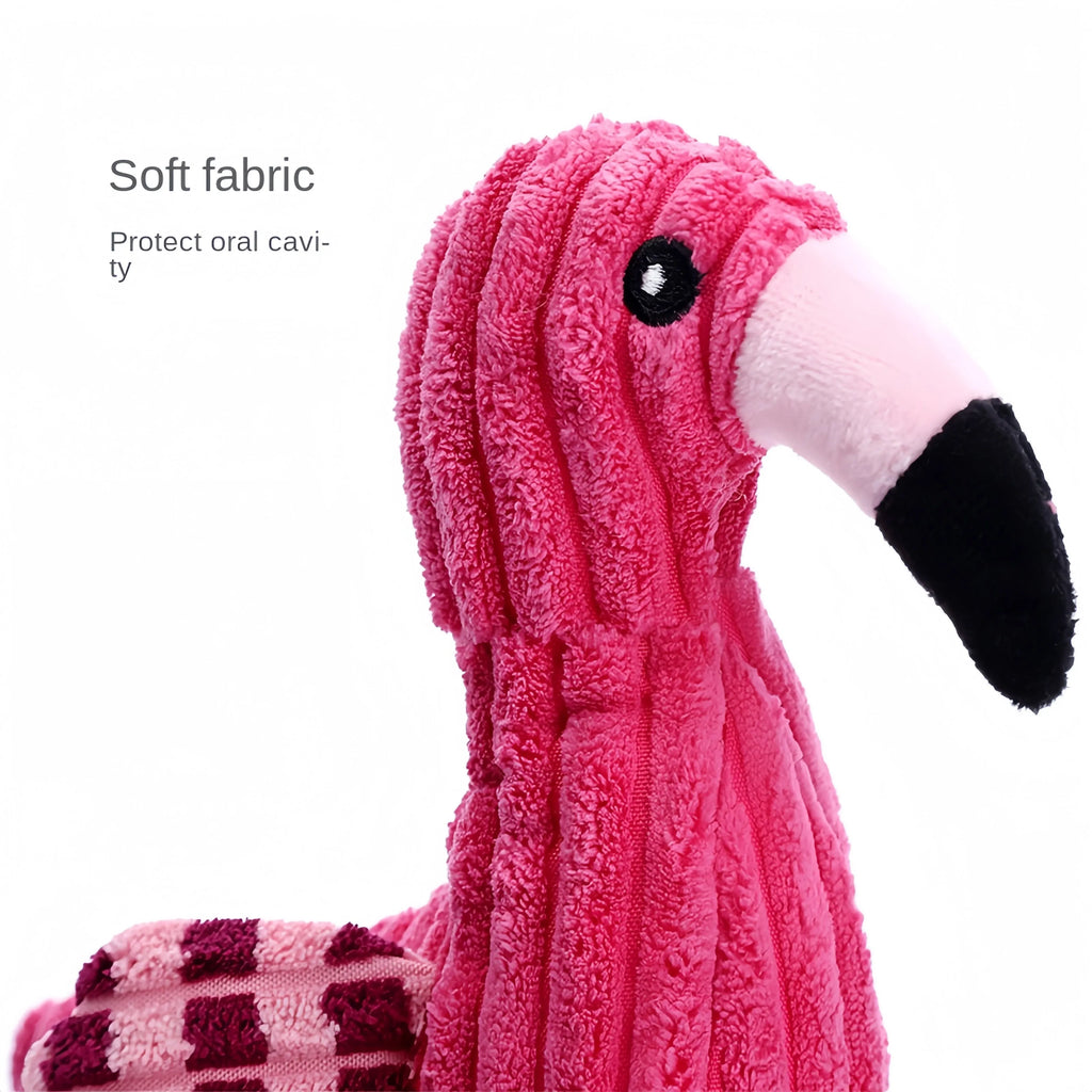 Pink corduroy animal-shaped dog toy with internal squeaker for bite-resistant play.