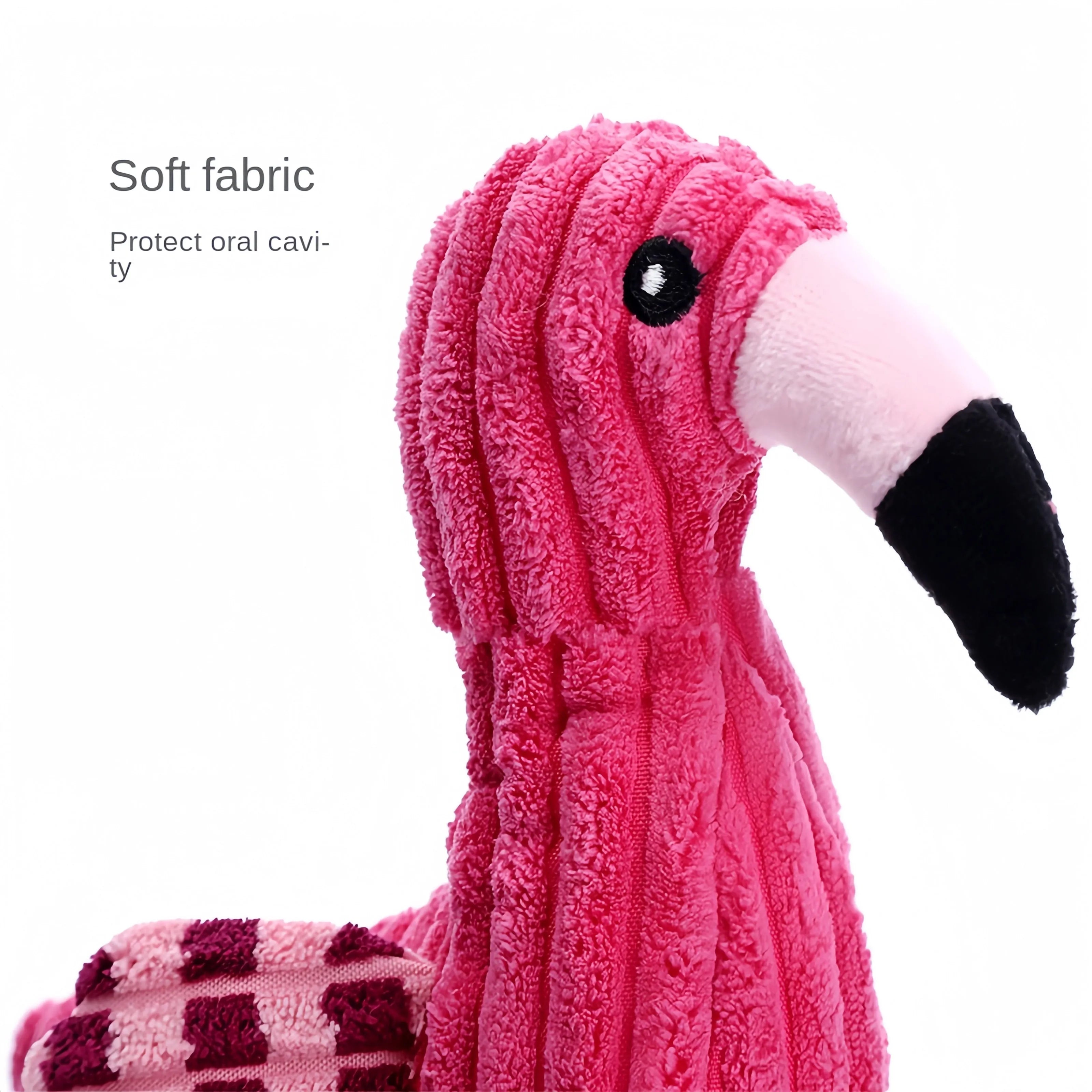 Pink corduroy animal-shaped dog toy with internal squeaker for bite-resistant play.
