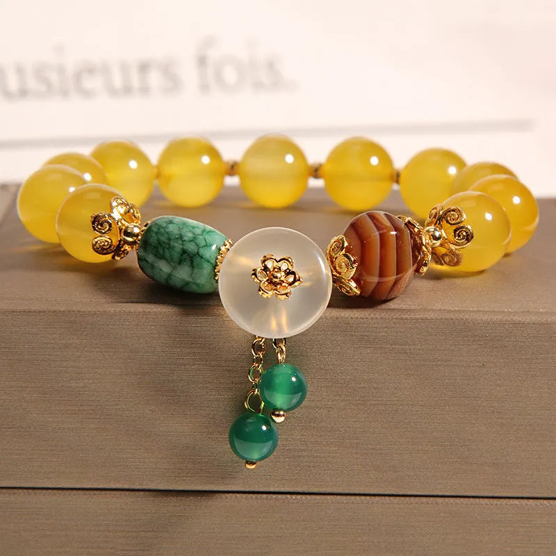 Yellow agate crystal bracelet with gold silk threading for women in khaki colour