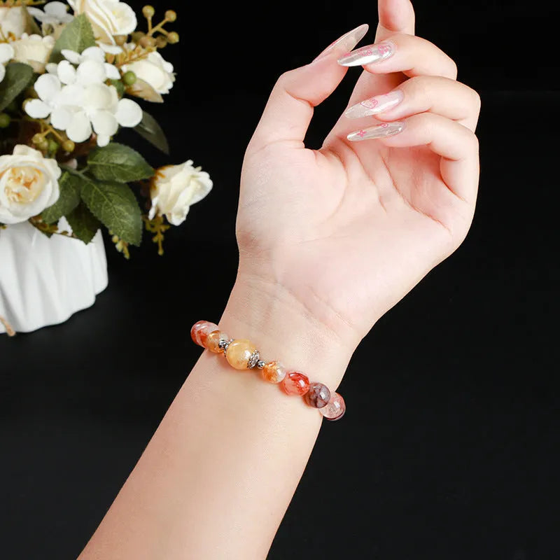 Handmade women's crystal bracelet with 10mm red sealant flower citrine lucky beads.