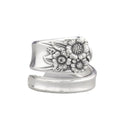 Retro flower shaped copper adjustable ring with daisy design on hand