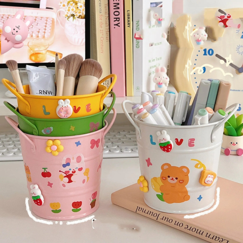 Round metal desk pen holder in green with decorative sticker patch design