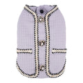 Dog wearing quilted polyester coat in cartoon style design available in three colours