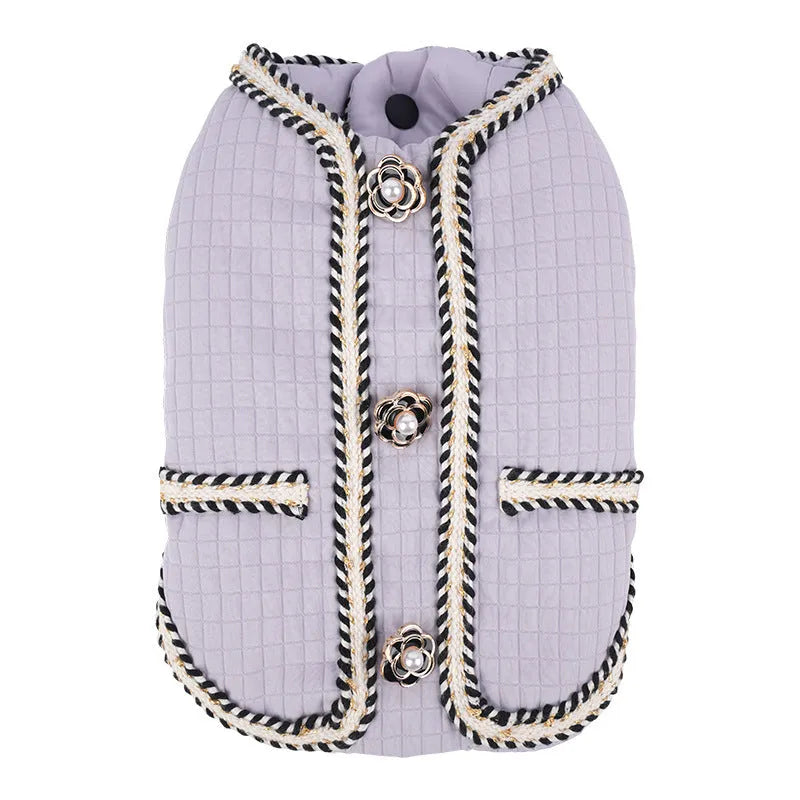 Dog wearing quilted polyester coat in cartoon style design available in three colours