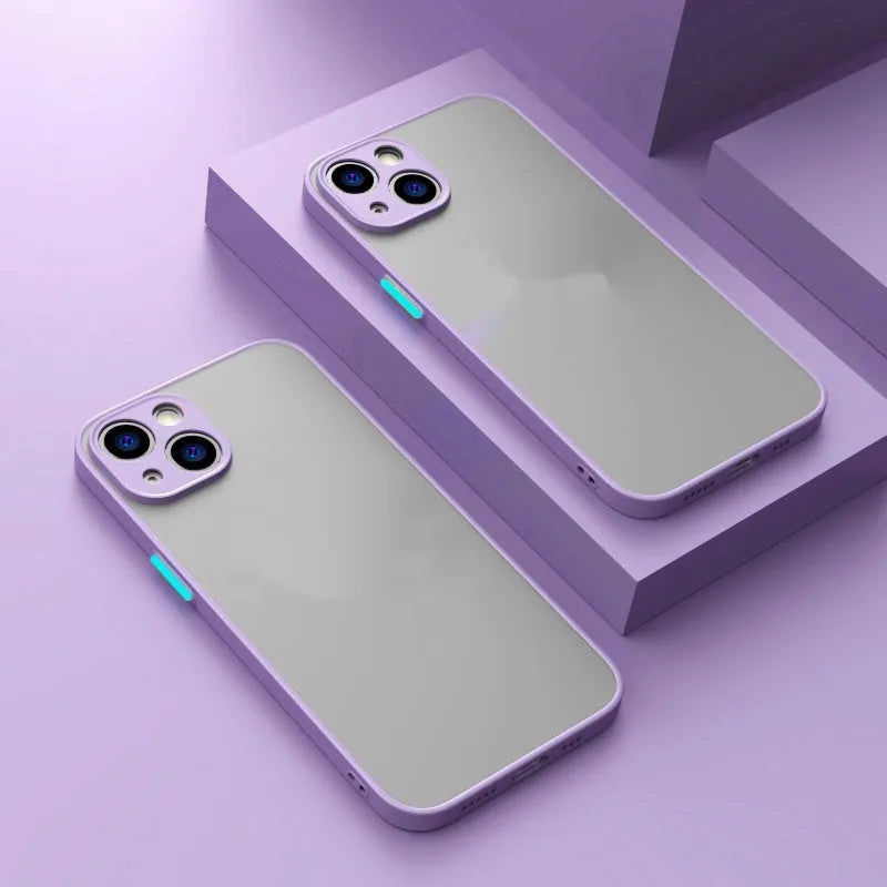 Frosted finish magnetic iPhone case shown in multiple colours on a table next to a phone