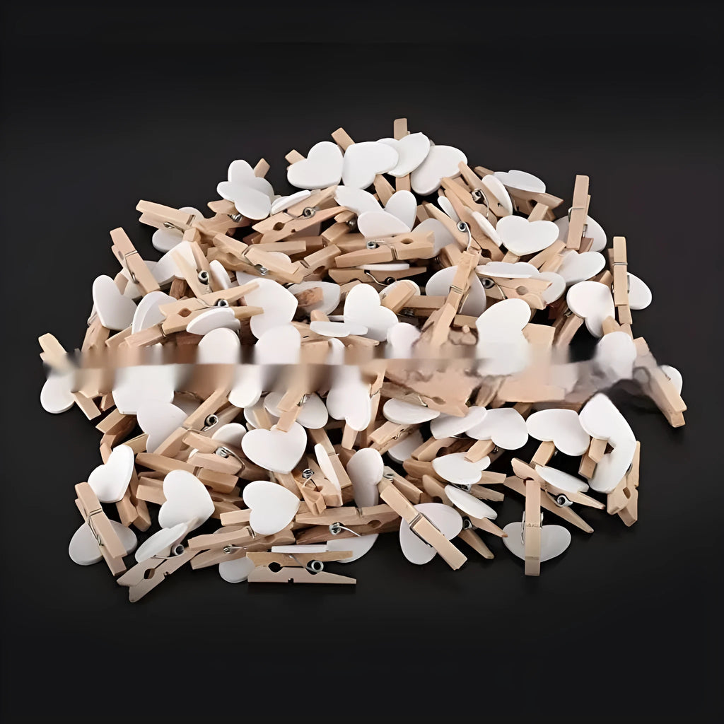 Five handmade solid wood heart-shaped clips in white, red, pink, rose, and yellow.