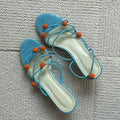 Cyan high-heeled sandals with thin strap lace-up design and open toe made from genuine French leather