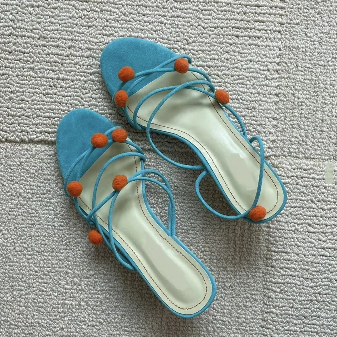 Cyan high-heeled sandals with thin strap lace-up design and open toe made from genuine French leather