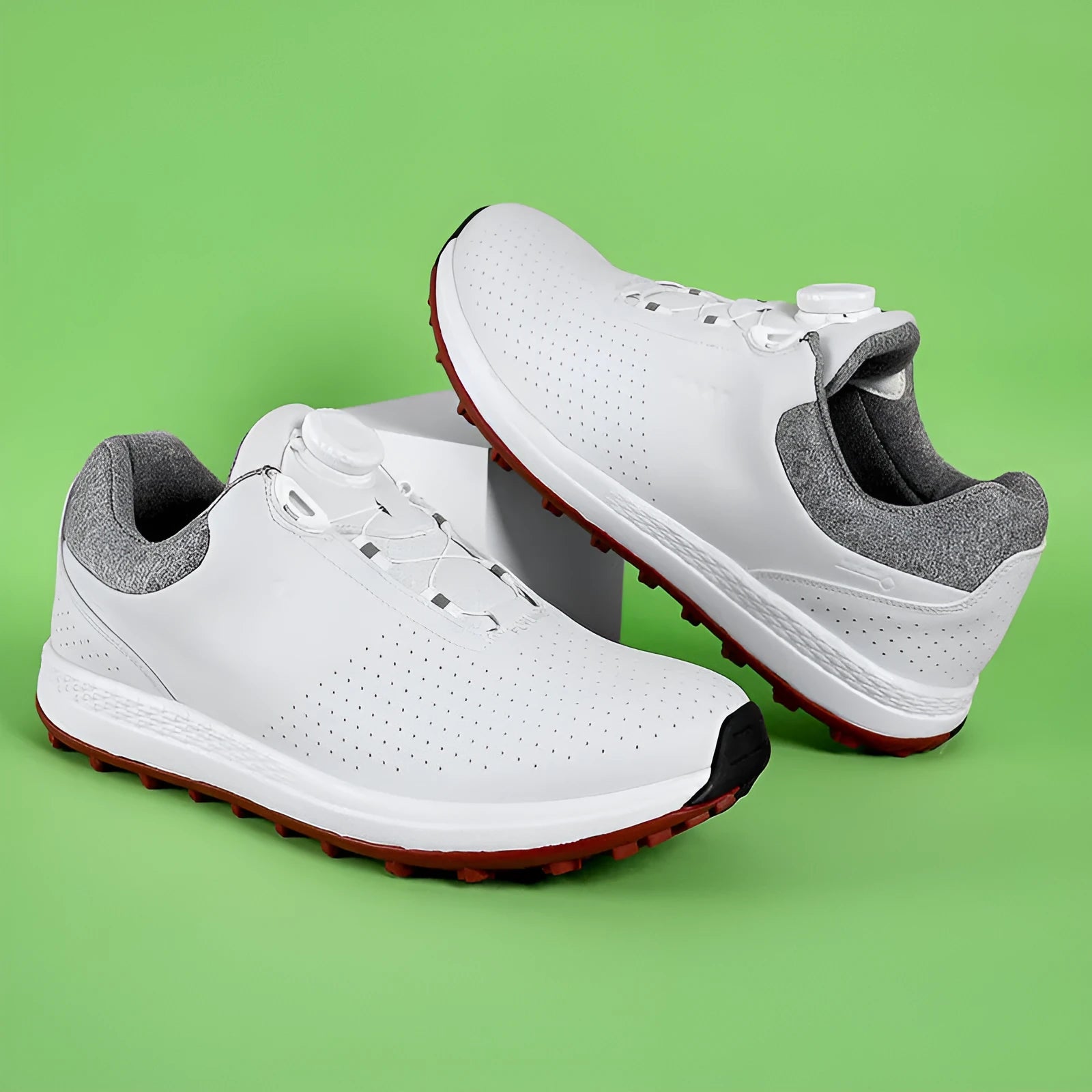 Men's white and black breathable golf shoes with non-slip broken nail sole and round toe.