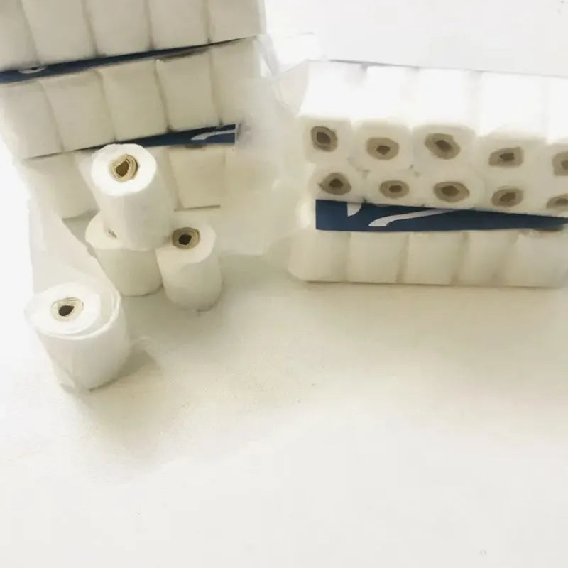 Miniature paper model of a tissue roll for children's play, measuring 30mm by 15mm by 80mm.