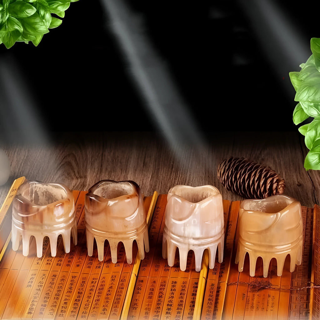 Black buffalo horn comb with wide teeth and pointed tip for shampoo application and head massage