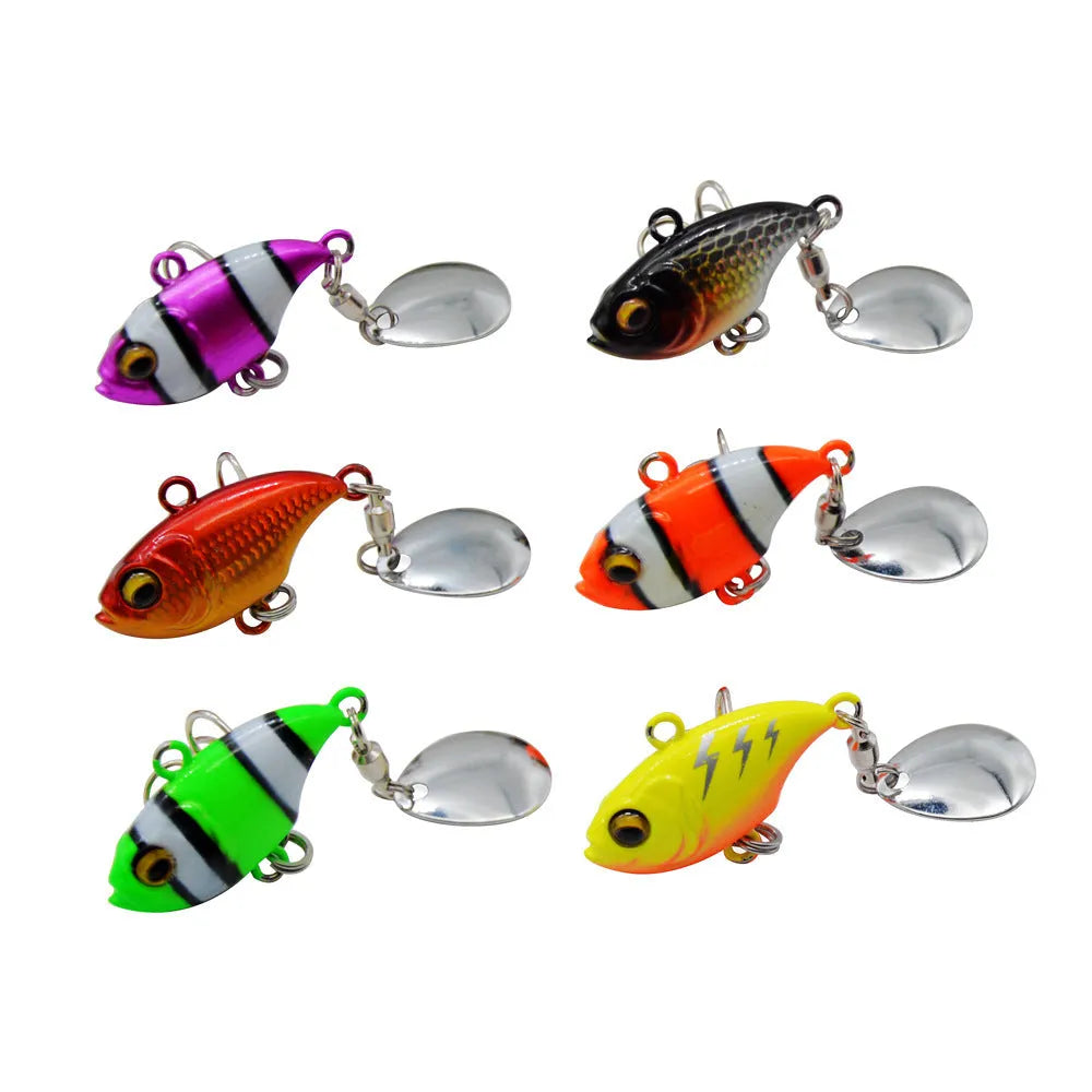 Metal sea fishing iron plate lure with small rotating sequins in gold colour variant.