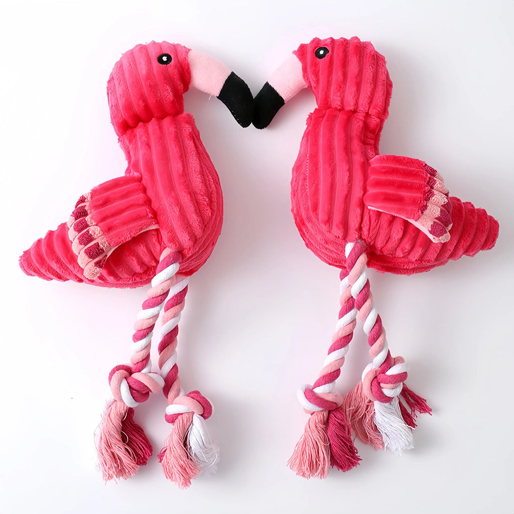Pink corduroy animal-shaped dog toy with internal squeaker for bite-resistant play.