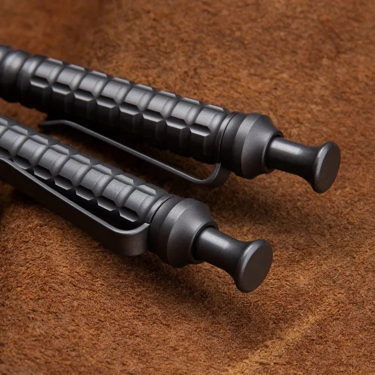 Gunmetal grey titanium alloy tactical push-action pen with 0.5mm nib