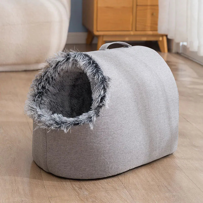 Fleece-lined enclosed cat bed with sleeping bag design shown in grey and brown colour options