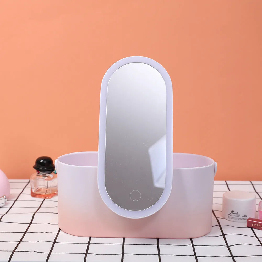 Pink gradient makeup storage box with LED mirror open showing storage compartments and USB charging port
