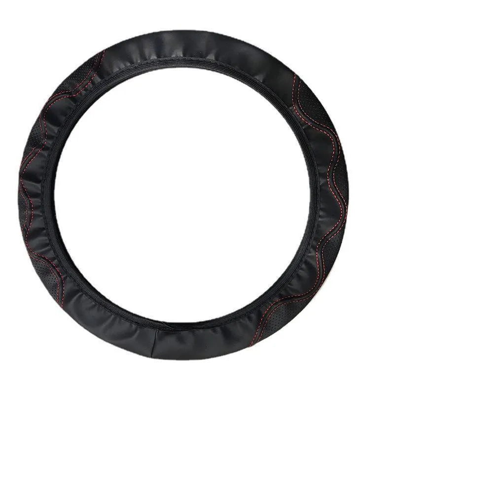 Elastic steering wheel cover with embossed corrugated texture for 37-38 cm diameter wheels.