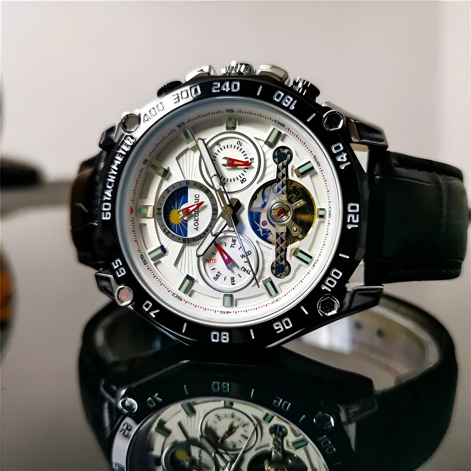 Men's automatic mechanical watch with multifunction display on wrist, showing natural silver case option.