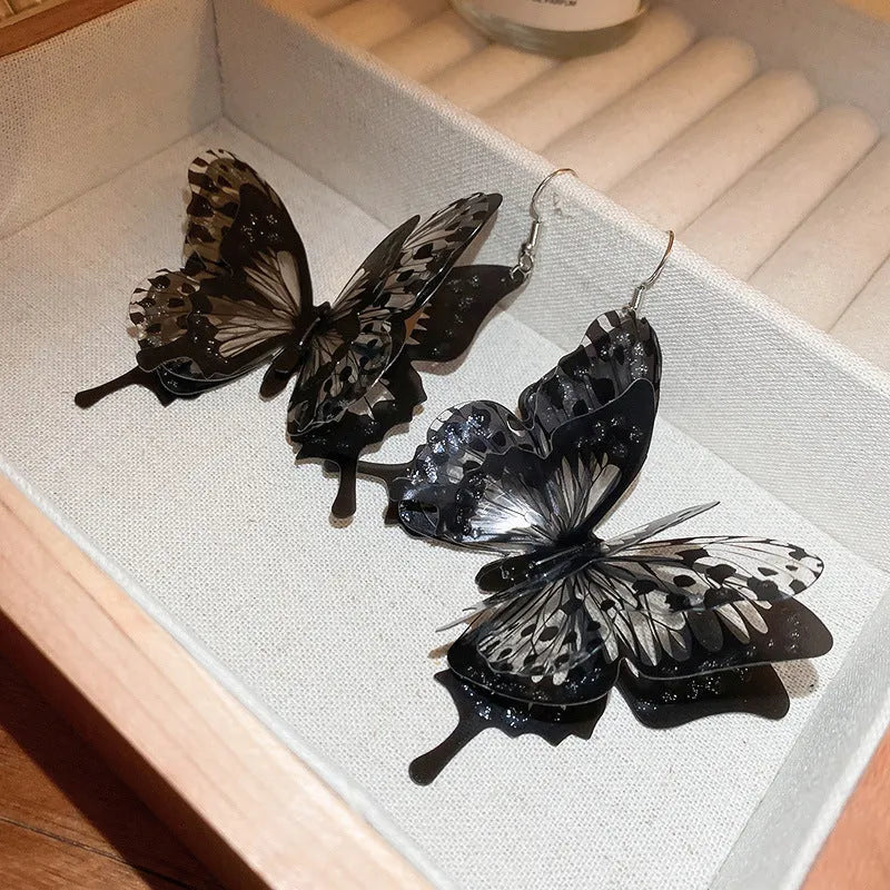 Black acrylic butterfly ear hook drop earrings with electroplated finish, 4.5 cm length