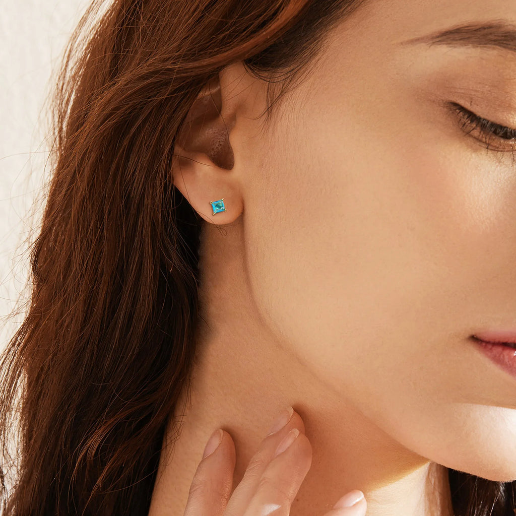 Gold-plated drop earrings with candy-coloured pear-shaped zircon stones.
