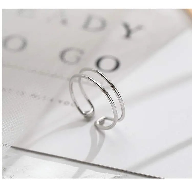 Silver geometric cross ring with adjustable opening for women