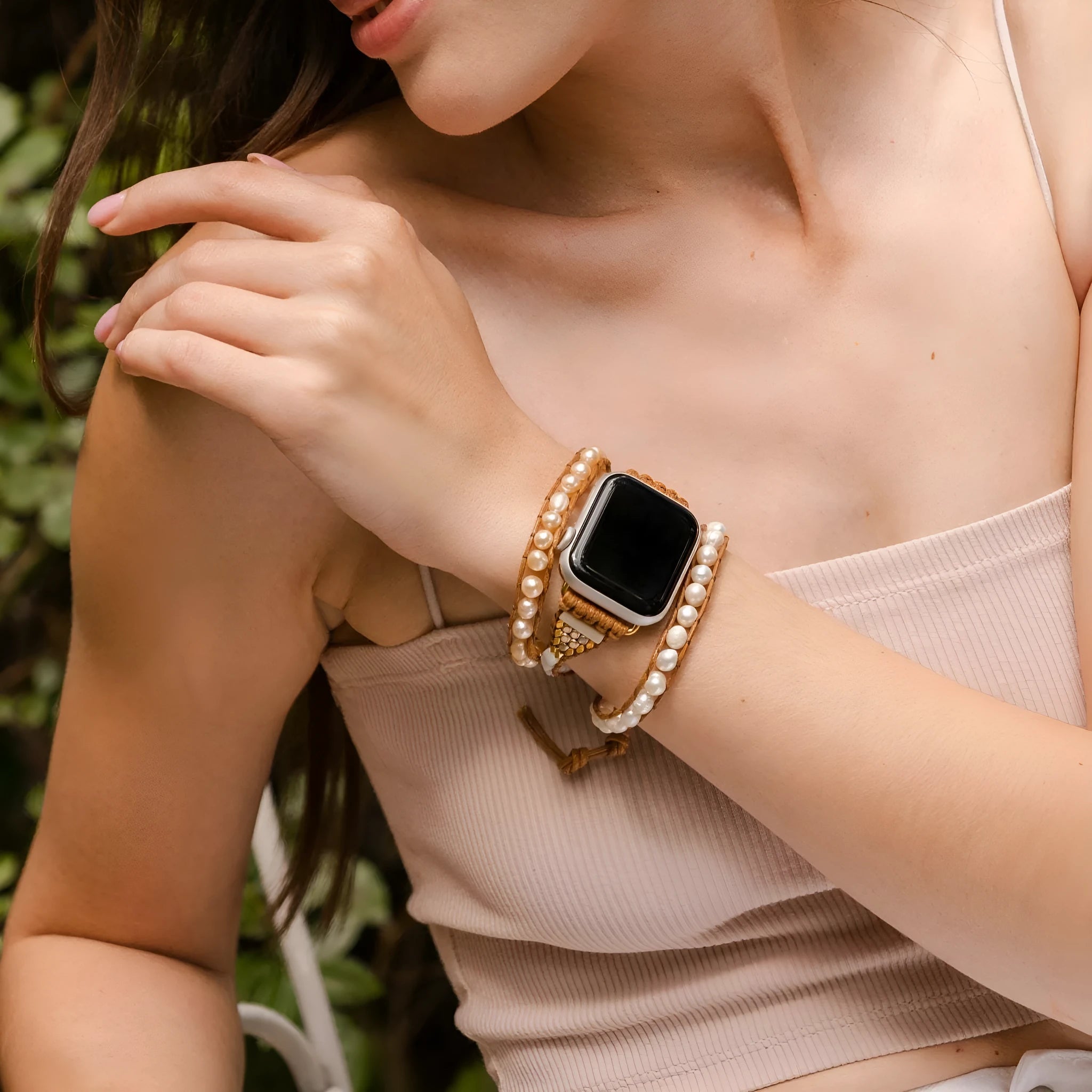 Handmade pearl watch strap on a wrist showing pearl accents, suitable for 38mm to 49mm dials
