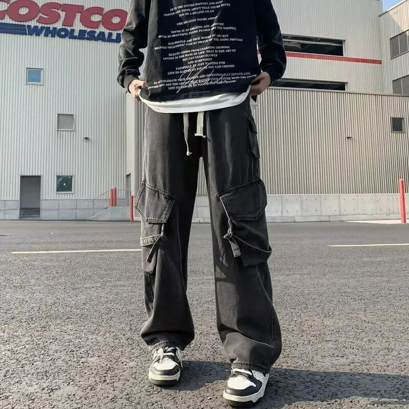 Men's heavy-duty loose multi-pocket washed casual pants in black synthetic fibre blend with button fly